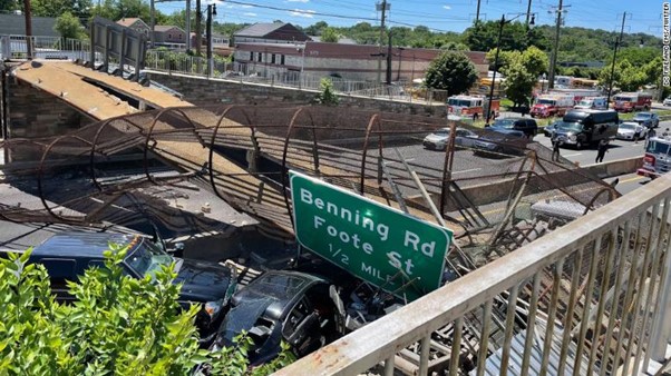 USA: Pedestrian Bridge Collapses Onto DC Freeway, Injuring Several People