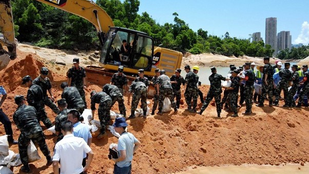 China: Desperate Search To Find Workers Trapped In Tunnel Flood