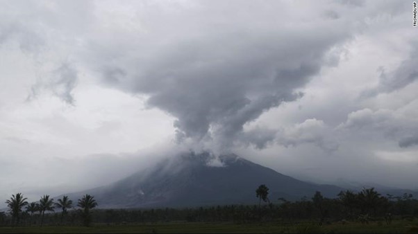 Rescue Workers Dig Through Thick Layers Of Hot Ash After Mount Semeru Erupts
