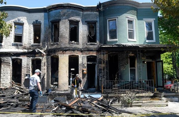 3 Hurt In Fire In Row Homes On Block Where Pride Flag Burned