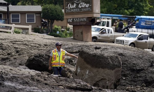 Rescuers Search For Person Missing In Los Angeles Mountain Area Mudslides As Thousands Evacuate