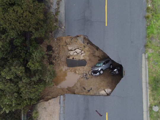 Sinkhole Swallows Mother, Daughter And Two Others Driving In California Storm