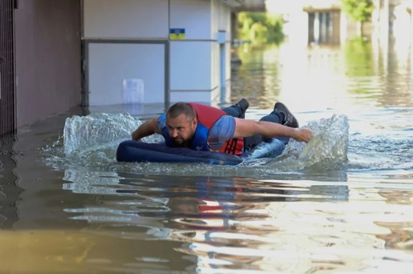 ‘You Can’t Even See The Roof’: Ukrainians Flee Dam Flood